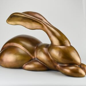 an aerodynamic rabbit made of bronze which is 22 inches long